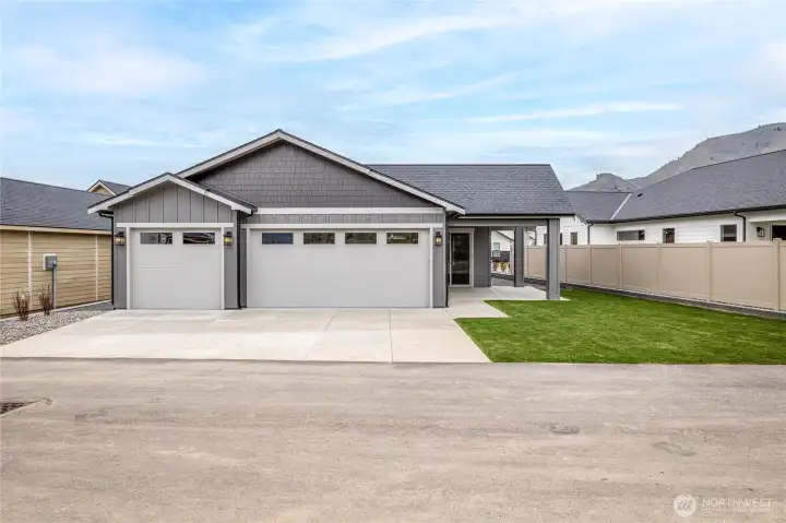 Back yard with rear 3 car garage