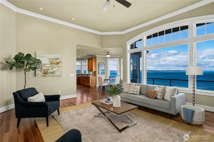 The open concept design on the main floor celebrates the view from the living room to the kitchen