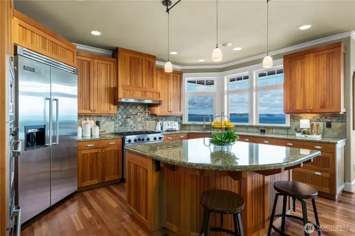 Gather around the island in this main floor kitchen