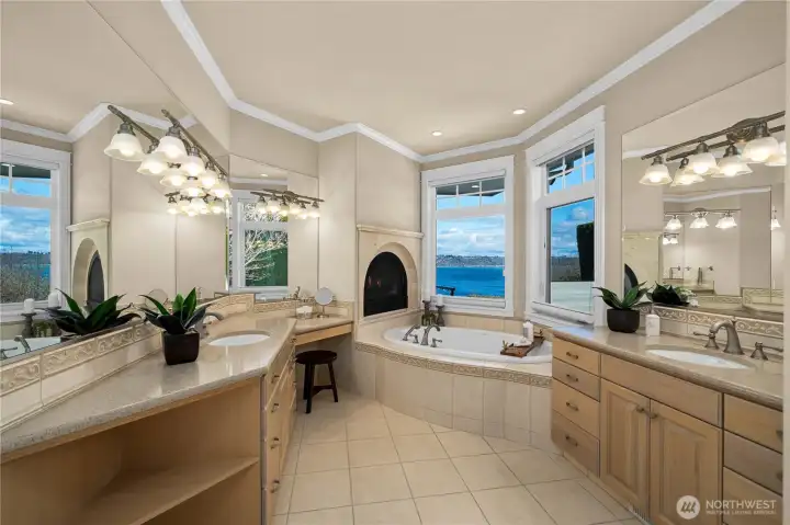 primary ensuite with fireplace and soaking tub