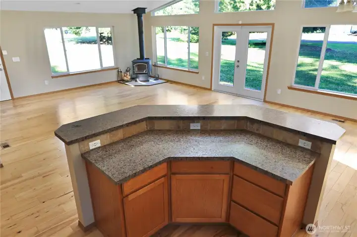 The open-concept layout keeps everyone connected, whether you’re cooking, entertaining, or relaxing by the fire after a day of adventure.