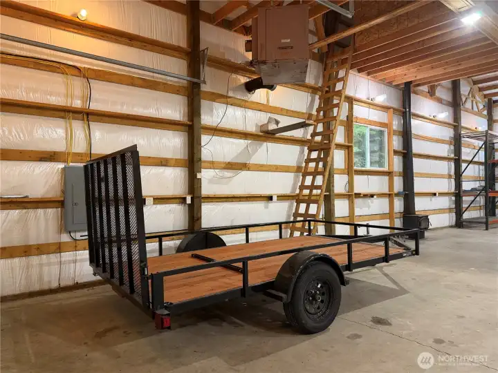 Hangar with trailer / utility space  The scale of this hangar is exactly what makes this property unforgettable — room for your toys, tools, trailers, and big dreams, all protected and ready for your next adventure.