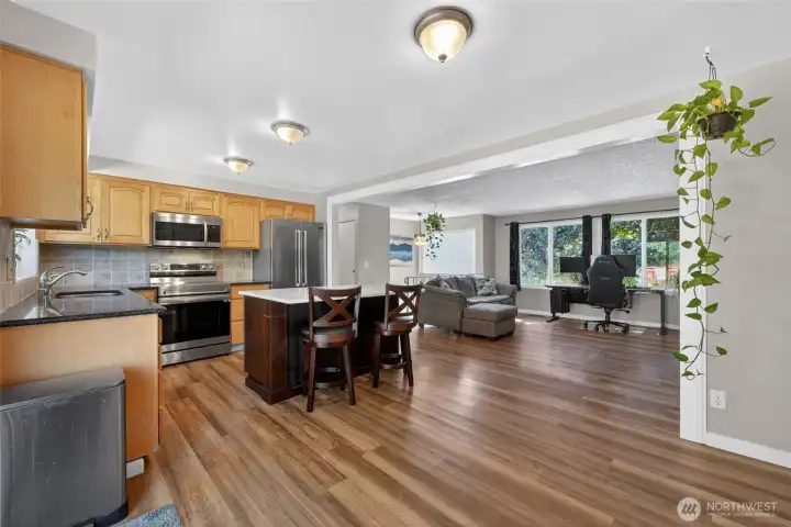 The dining area is open to the kitchen and the living room for easy flow gatherings. The dining area is open to the kitchen and the living room for easy flow gatherings.