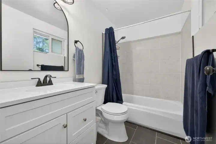 Updated private bath with modern finishes. Updated private bath with modern finishes.