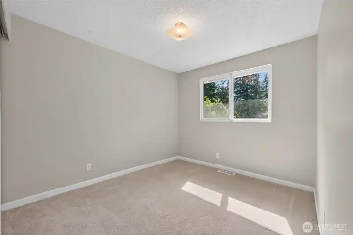 Flexible bedroom space for guests, work, or hobbies. Flexible bedroom space for guests, work, or hobbies.