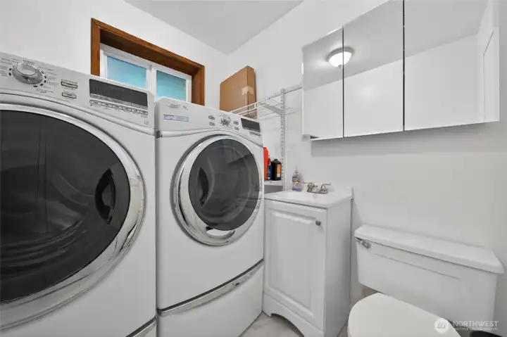 Laundry room and bathroom combo. Laundry room and bathroom combo.
