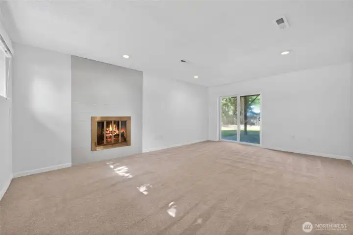 Second fireplace creates warmth and character downstairs. Second fireplace creates warmth and character downstairs.