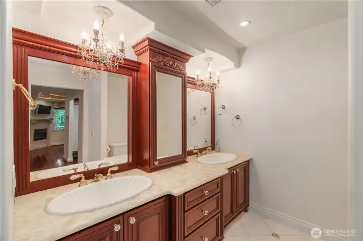 Primary bath with under cabinet lighting.