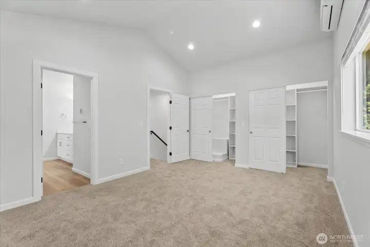 Primary bedroom with double closets Primary bedroom with double closets