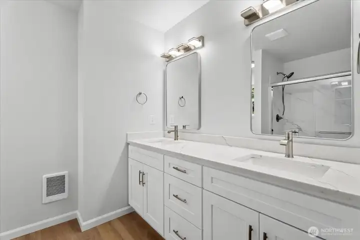 Primary ensuite bathroom with double vanity and shower Primary ensuite bathroom with double vanity and shower
