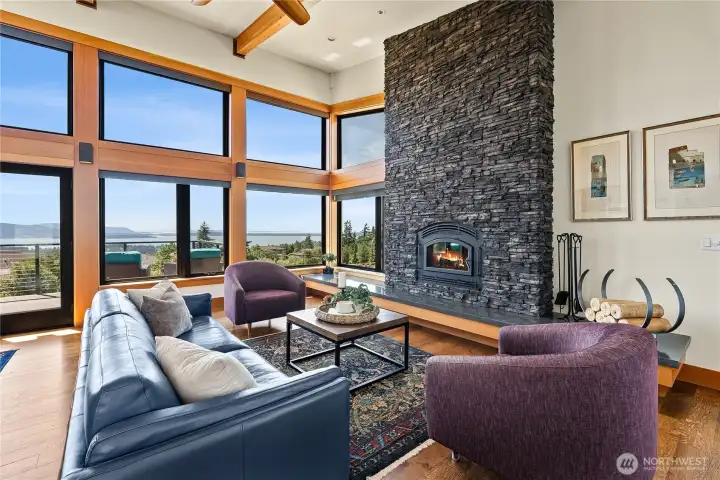 Gorgeous stone surround wood burning fireplace