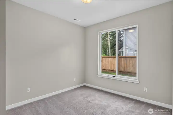 Main level bedroom can also double as an office.