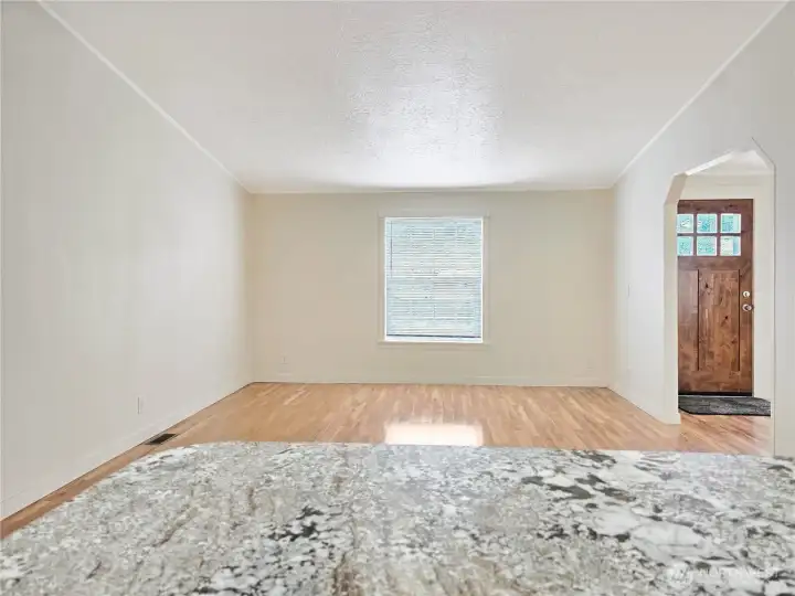 A spacious kitchen designed for everyday living and entertaining, offering generous prep space, ample storage, and an open flow to the gathering room.
