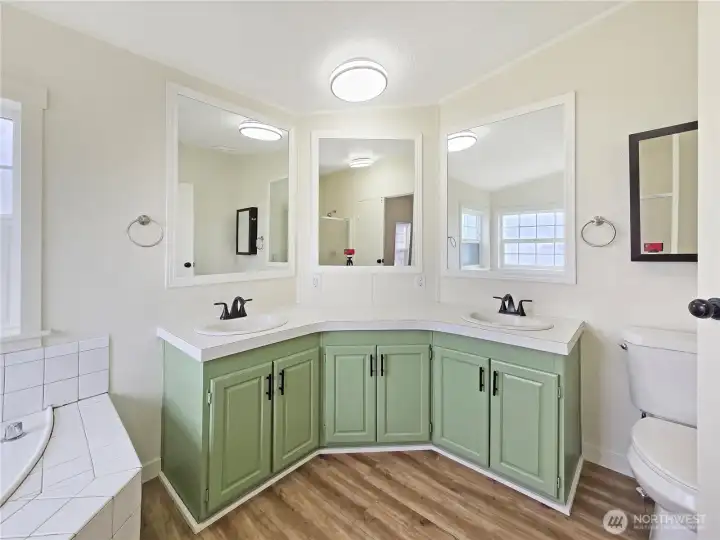Separate dual-sink vanity offers both style and everyday functionality.