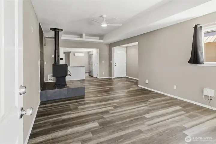 Front Entry area into open concept living, all new interior flooring, drywall paint and lighting. Front Entry area into open concept living, all new interior flooring, drywall paint and lighting.