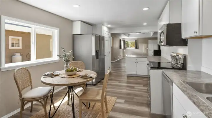Virtually Staged Kitchen Dining Room, plenty of space in here for your open concept living. Virtually Staged Kitchen Dining Room, plenty of space in here for your open concept living.