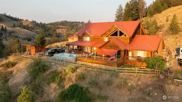 Beautiful log home on 2 parcels totaling 32.5 acres