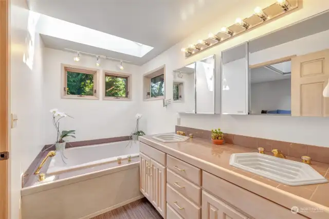 Jetted Tub and Double Sinks in the Spa-like Primary Bath.