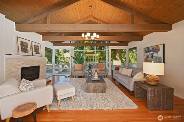 Exposed beams & window wall.