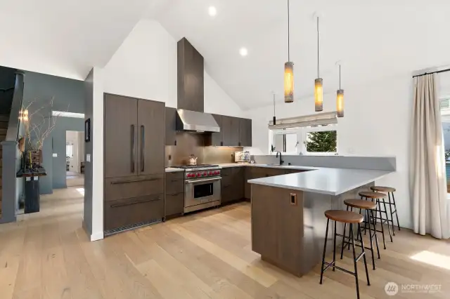 Custom backsplash and artisan light fixtures
