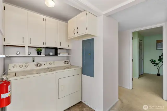 Full size washer and dryer in the unit! And with even more storage.