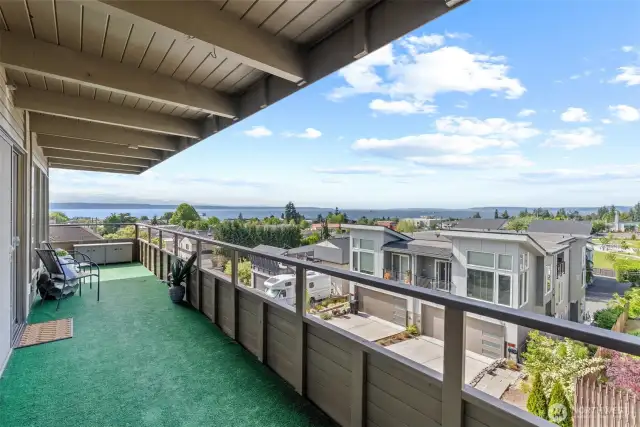 Entertainment sized deck with sweeping views! Enjoy a relaxing morning with coffee or a beautiful summer sunset with a glass of lemonade.