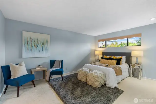 Primary bedroom is oversized to accommodate a sitting area or larger sized furniture. Also has double closets!