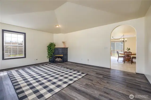 Living room with gas fireplace for cozy winter evenings.