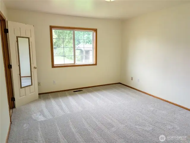 Large primary bedroom. New carpets installed 7/18!