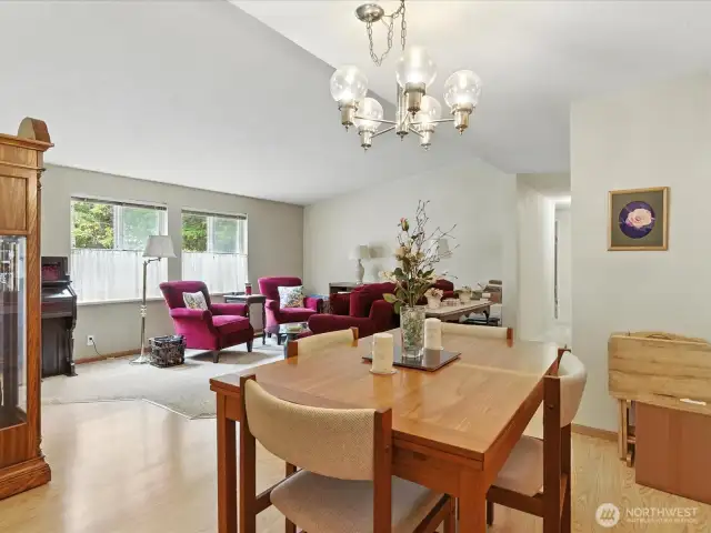The dining area offers a great space for hosting dinners and special gatherings, seamlessly connected to the formal living room for a cohesive and open feel.