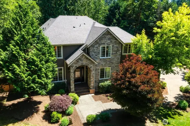Surrounded by nature in a private setting at the end of a lane, this beautiful home backs on to open space