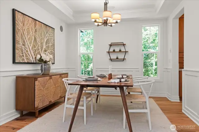 All-occasion dining room easily accomodates extended table and hutch