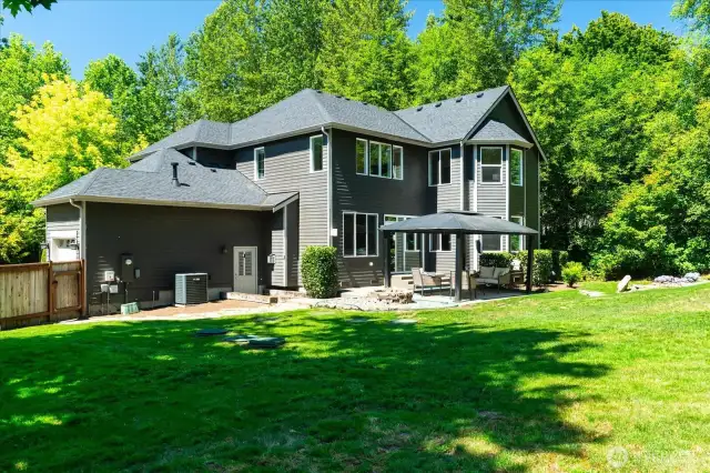 Plenty of room to play, and enjoy year round with covered pergola, and a firepit to roast s'mores