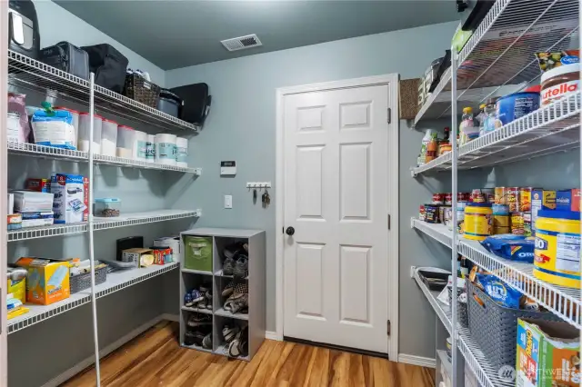 Pass through pantry to garage...tons of storage here!
