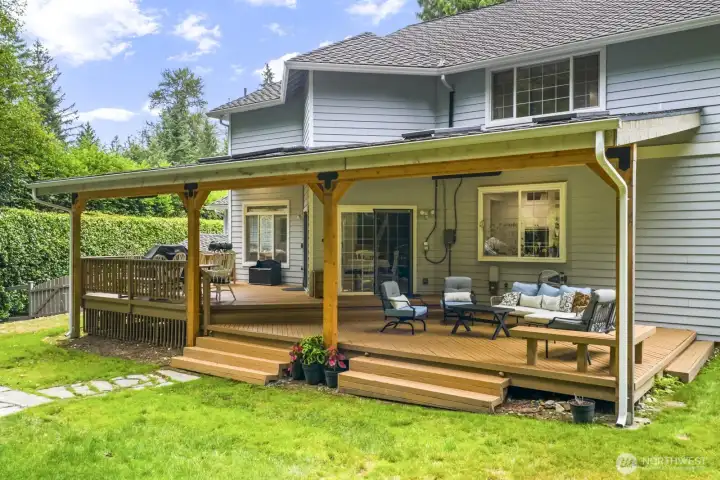 Step outside to your private west-facing backyard oasis, fully fenced and backing to a lush greenbelt.