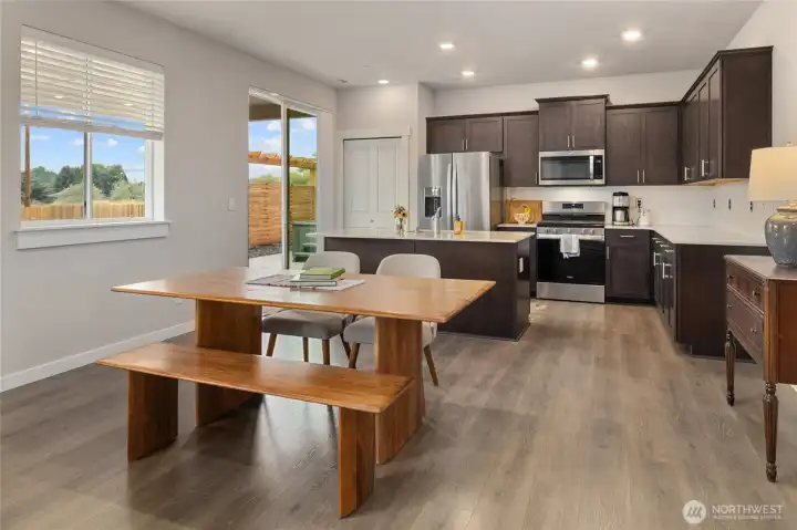 Walk right out of the sliding doors to the expansive, covered, patio
