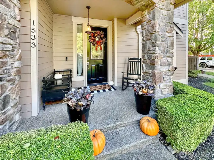 Welcome!! Ample covered porch greets visitors and offers a great place to sit a spell.