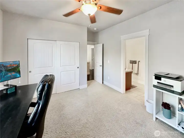 Ample 2nd bedroom with direct access to hall bath.  All bedrooms have ceiling fans.