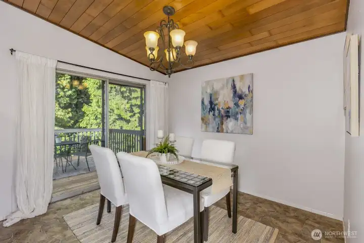 Ding room with slider to the deck & backyard.