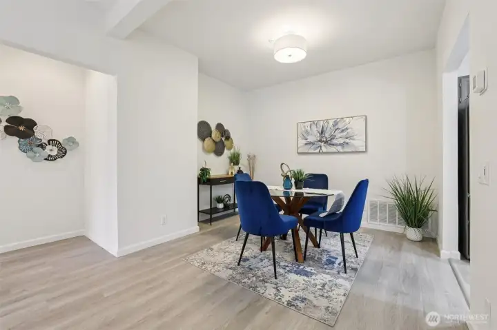 Taller ceilings, refreshed paint, new light fixtures,  flooring and trim