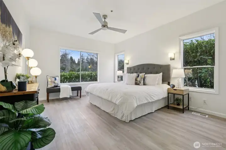 Primary bedroom is light and bright with comfortable layout.