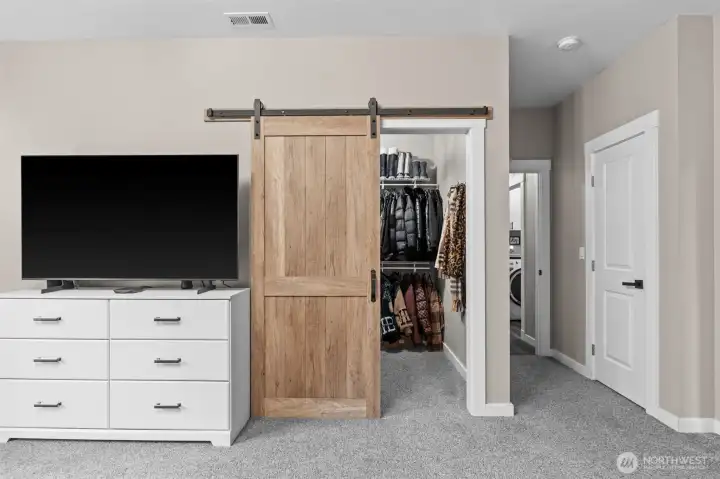 Walk-in closet in primary bedroom