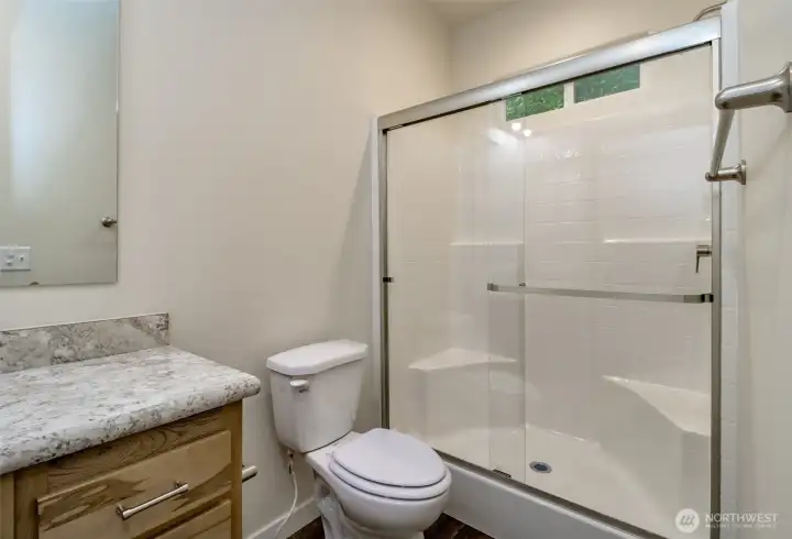 Primary walk in shower bathroom