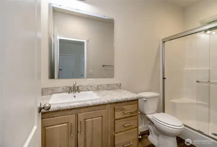 Primary walk in shower bathroom