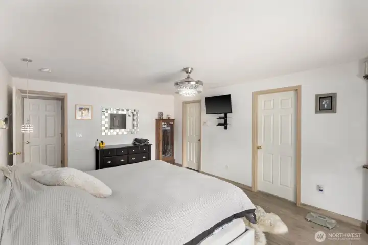 Primary Bedroom with ensuite bath and a walk-in closet