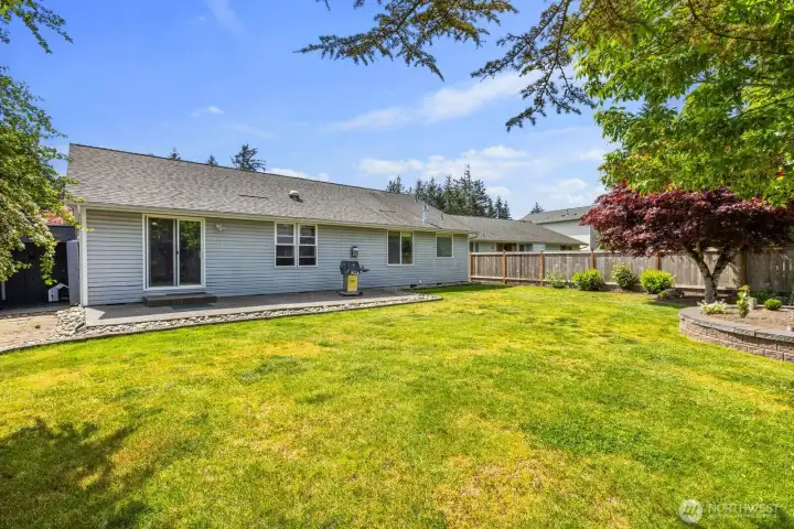 Huge, sunny back yard.  Fully fenced