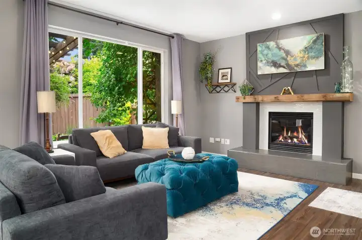Curl up on the couch and enjoy the fireplace in the Family Room. Large windows and the luxury vinyl plank flooring completes this space. Curl up on the couch and enjoy the fireplace in the Family Room. Large windows and the luxury vinyl plank flooring completes this space.