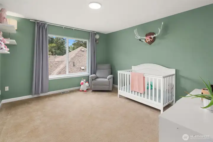 Bedroom on upper level. Bedroom on upper level.