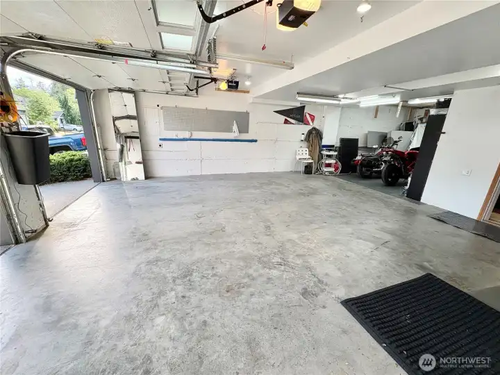 3-car garage with space for hobbies and home improvement projects. 3-car garage with space for hobbies and home improvement projects.