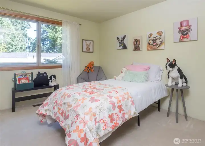 One of three bedrooms located on the upper level, this room is conveniently served by a well-appointed hallway bathroom.